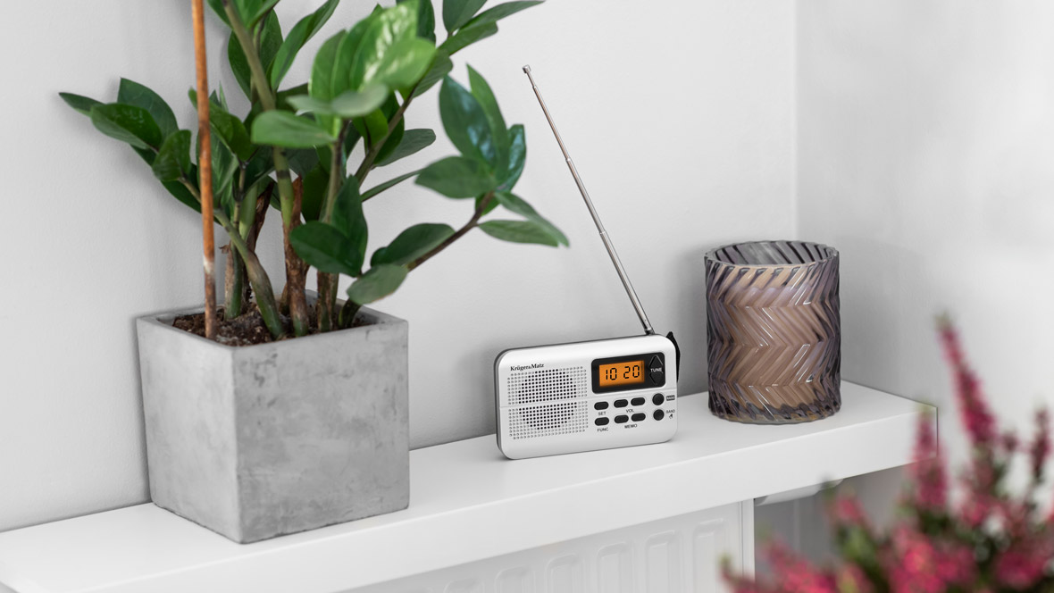 Mini pocket radio with alarm clock